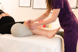 Acupuncture on Leg of Pregnant Woman